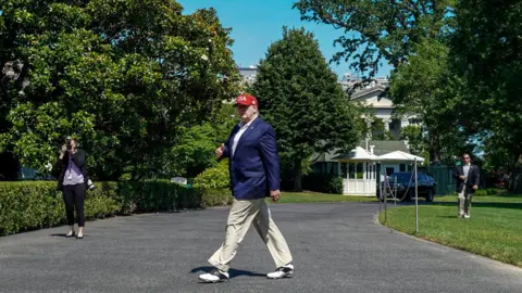 Getty Images Trump returns from the Camp David presidential retreat in late June 2019