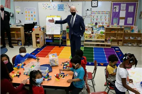 Getty Images President Biden speaks to students in a New Jersey classroom