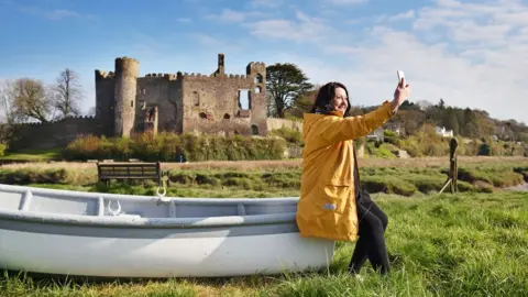 Carmarthenshire council woman posing for photo