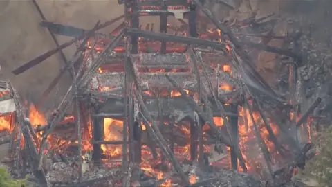 Temple hall burning