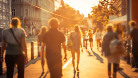 Getty Images people walking into the sunset