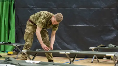 Ministry of Defence Soldier makes beds