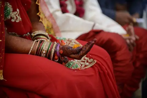 Getty Images Representational image of a bride and groom