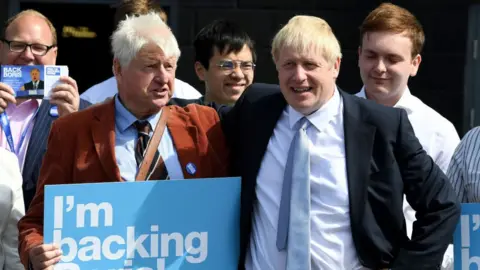 Getty Images Former Prime Minister Boris Johnson campaigning with his father, Stanley Johnson