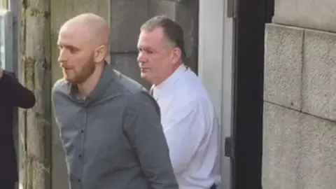 BBC Robbie McIntosh leaving court