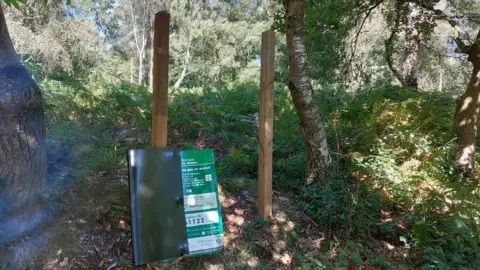 Ashdown Forest/Horizon Parking A damaged carpark sign
