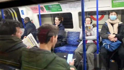 AFP Few commuters travel on the Tube train during the morning rush hour time of 0830 from Clapham North to central London