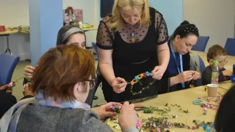 Anna Ekvist Group making traditional Ukrainian headband