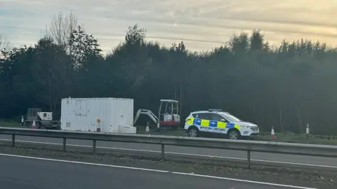 Police search a lay-by on the A19