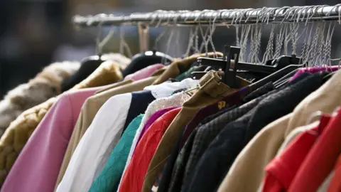 Getty Images Second hand clothes on a rail