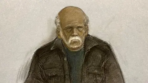 PA Media Court sketch of Ryland Headley who has receding white hair and facial hair and is wearing a brown jacket.