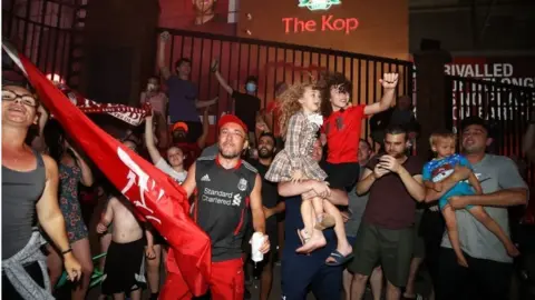 PA Media Liverpool fans at Anfield