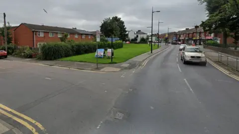 Google Moston Lane, close to the junction with Gill Street