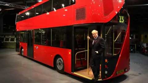 Getty Images Boris Johnson with a Boris Bus