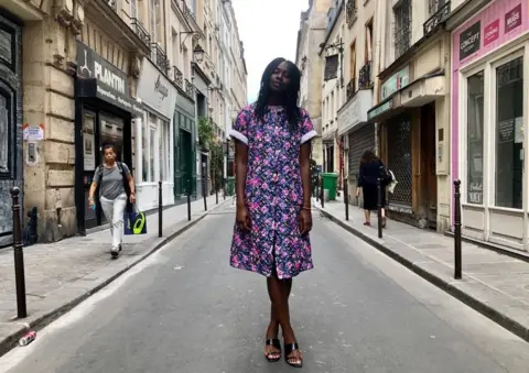 Alexandre Bancharel Client modelling a Marche Noir vintage dress