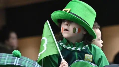 PACEMAKER Thousands watched the St Patrick's Day parade in Belfast for the first time in three years