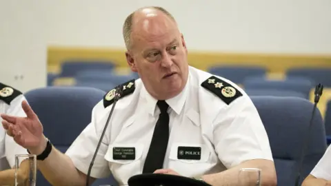 Liam McBurney/PA PSNI Chief Constable George Hamilton