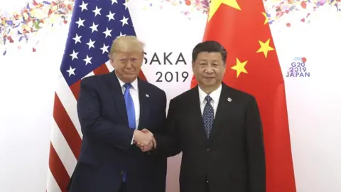 Getty Images Chinese President Xi Jinping (R) shakes hands with US President Donald Trump before a bilateral meeting during the G20 Summit on June 29, 2019 in Osaka, Japan.