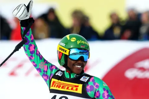 Getty Images Sabrina Simader of Kenya celebrates at the finish during the Women's Super G during the FIS Alpine World Ski Championships on February 7, 2017 in St Moritz, Switzerland.