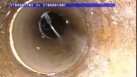 Welsh Water A fork stuck in a pipe