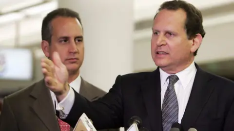 AFP Cuban-American member of the US House of Representatives Lincoln Diaz-Balart (Right) speaks during a press conference at Miami's International Airport after he and his brother Rep. Mario Diaz-Balart (Left) returned from Washington, DC on 2 August 2006.