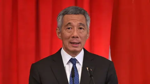 AFP/Getty Images Singapore's Prime Minister Lee Hsien Loong speaks at a joint press conference with Indonesia's President Joko Widodo (not pictured) after witnessing a signing ceremony for a memorandum of understanding agreement between both countries at the Istana presidential palace in Singapore on 28 July 2015.