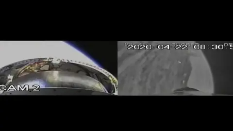 AFP Screengrab from Iranian state TV purportedly showing footage from the Nur satellite after launch