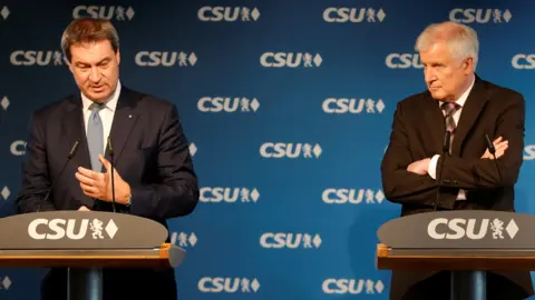 Reuters CSU leaders Markus Söder (L) and Horst Seehofer, 15 Oct 18