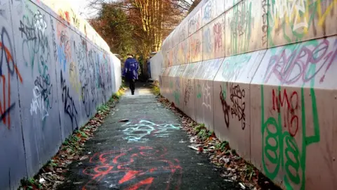 PA Media Graffiti daubed on 'Monkey Bridge' at Mere Green, Sutton Coldfield,