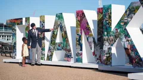 PA RAF veteran Tom Weatherall, 84, with Maraki Tewodros, five, at the launch of the Royal British Legion"s "Thank You" campaign