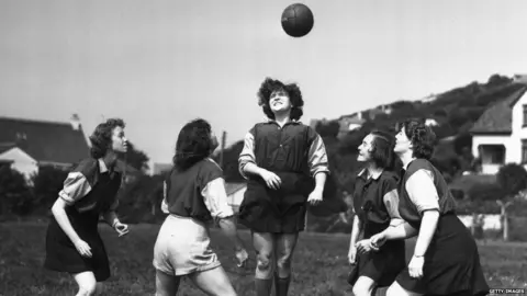 Getty Images 6 September 1954: Members of The Amazons women's football team, training at Combe Martin, Devon