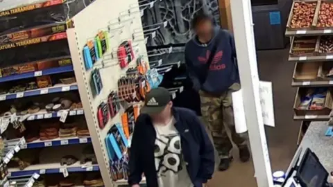 Mansfield Aquatic, Reptile & Pet Centre CCTV image of two men