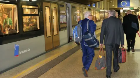 Welsh Government Mark Drakeford arriving in Brussels on the train