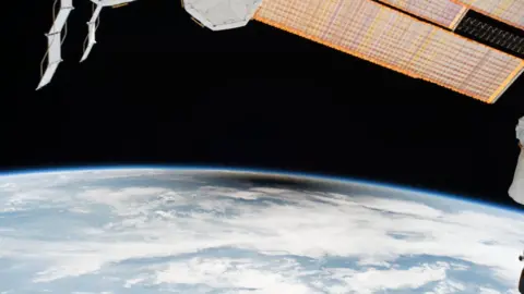 NASA As millions of people across the United States experienced a total eclipse as the umbra, or moon's shadow passed over them, only six people witnessed the umbra from space. Viewing the eclipse from orbit were NASA's Randy Bresnik, Jack Fischer and Peggy Whitson, ESA (European Space Agency's) Paolo Nespoli, and Roscosmos' Commander Fyodor Yurchikhin and Sergey Ryazanskiy. The space station crossed the path of the eclipse three times as it orbited above the continental United States at an altitude of 250 miles.