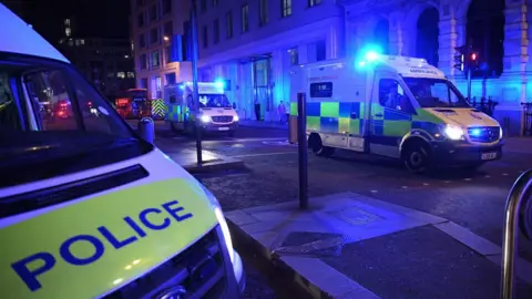 Getty Images Police and ambulances at London Bridge attack