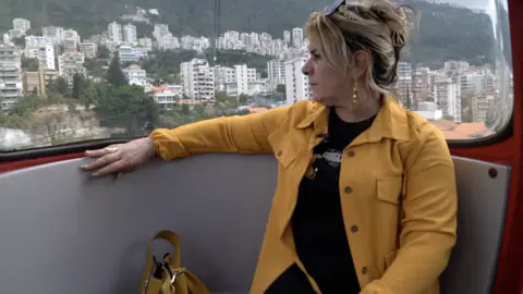 BBC/Jewan Abdi Janna Hussein on a gondola ride