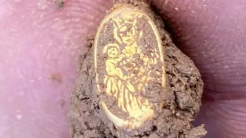 Matthew Hepworth The ring just after it was dug out of the ground