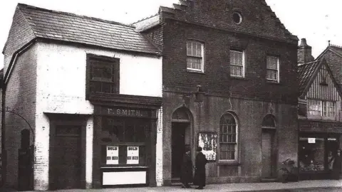 March Museum A black and white photo from around 1933 shows the frontage of shops and the church hall, run by St John's Church in March. The building in the middle and a white one to the left were demolished to erect the current former NatWest building, now a Turkish restaurant.