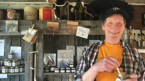 Elizabeth Hotson Per Pesula in his gift shop