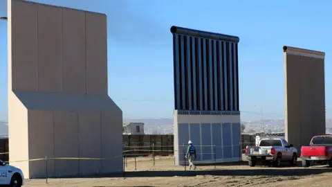Reuters Three of Donald Trump's eight border wall prototypes are shown near completion along US- Mexico border in San Diego, California, October 23, 2017