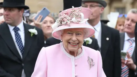 PA Media The Queen at a Buckingham Palace garden party in 2019