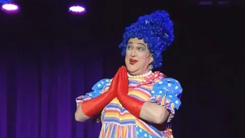 Charlotte Humphries Paul Smith as Mrs Palmer