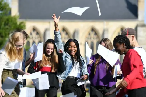 PA Media Girls with results papers