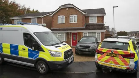 PA Media Police outside the house of Thomas Maher in Warrington