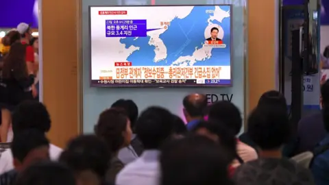 AFP News of the earthquake was broadcast in Seoul, South Korea