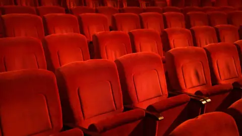 Getty Images Seats in a theatre auditorium