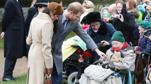 Getty Images Prince Harry and Meghan Markle spoke to members of the public