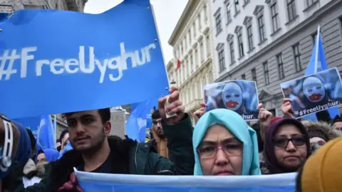 Getty Images People take part in a demonstration against Chinas persecution of Uighurs in Xinjiang, in Vienna