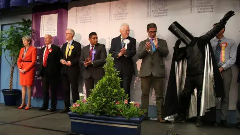 AFP Lord Buckethead performs the dance move at the declaration of the winner, near - but not too near - PM Theresa May