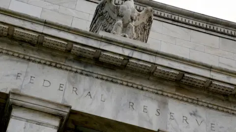 An eagle tops the U.S. Federal Reserve building's facade in Washington.
